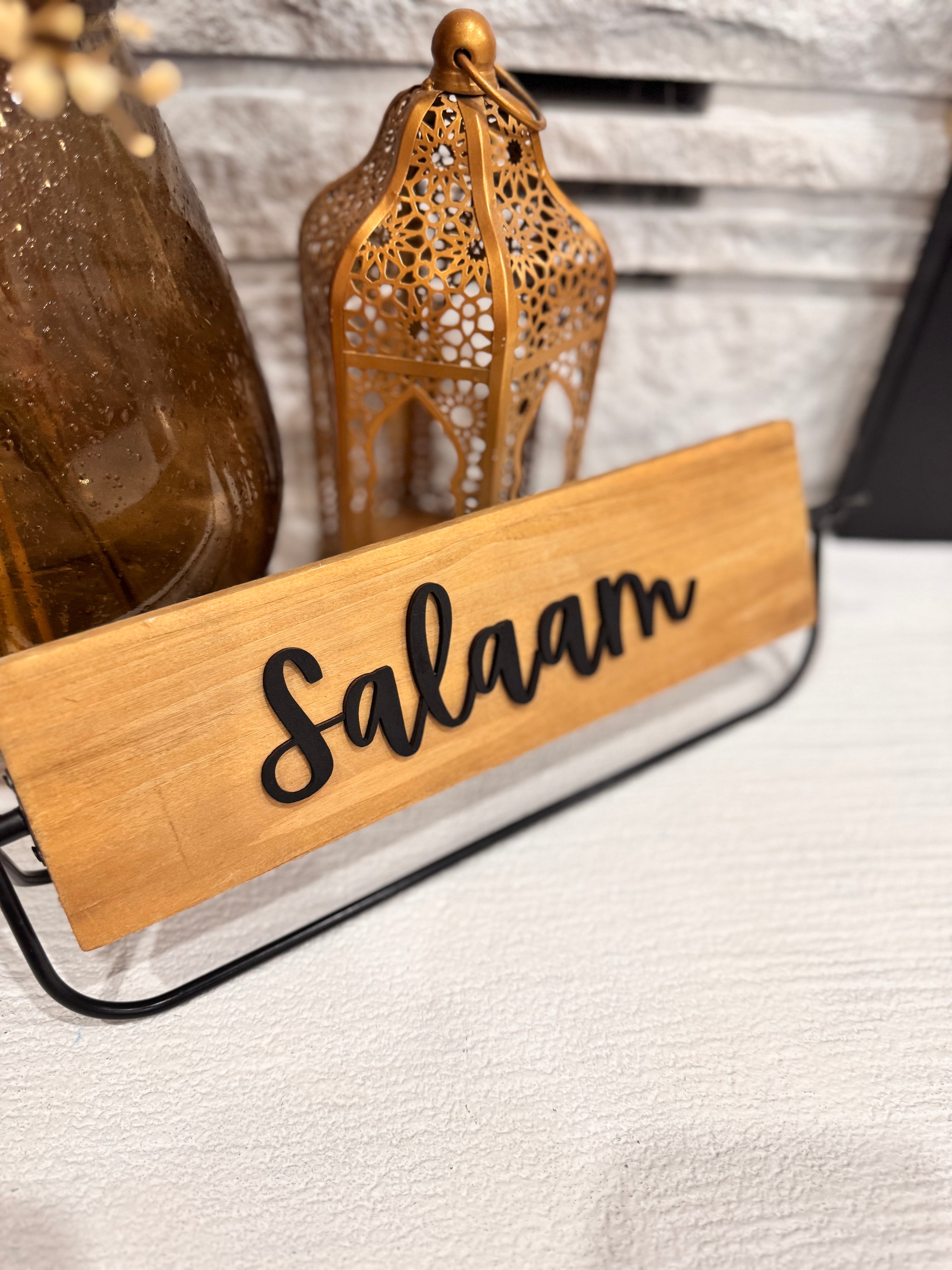 Salaam rotating wood sign